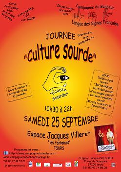 Affiche de la journée sur la culture sourde, sur fonds dégradé du orange au jaune de l'extérieur vers le centre. Au milieu de l'affiche un rond jaune avec à l'intérieur le dessin d'un oeil dans la forme de la lettre "C" représentée par une main, le programme est écrit en noir et il y a une photo de Mireille et Jérôme